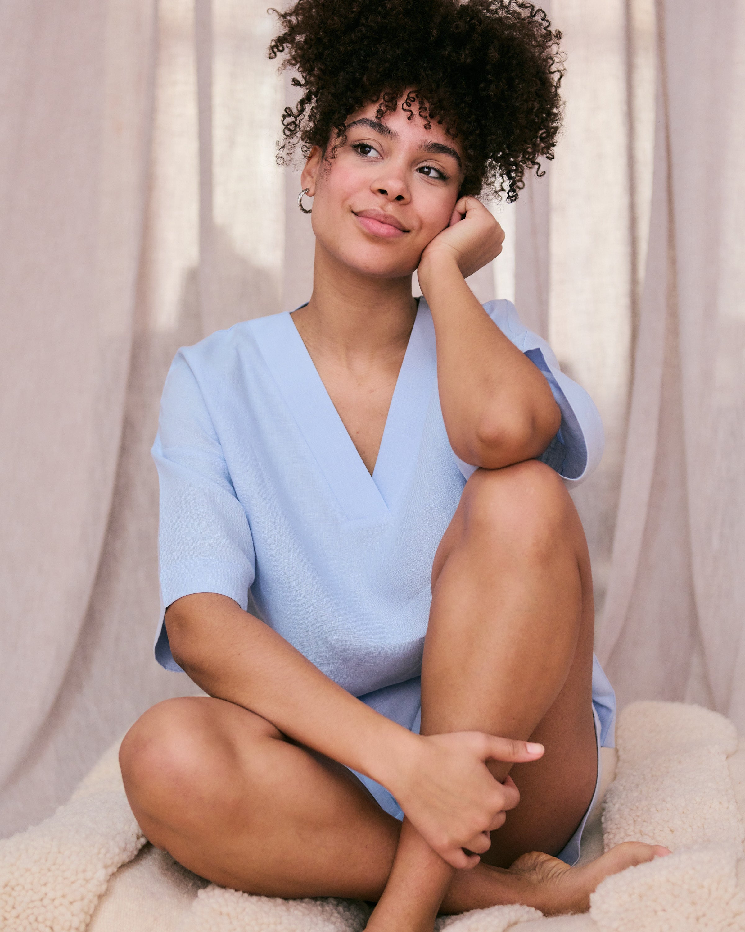 Comfortable light blue linen top and shorts.