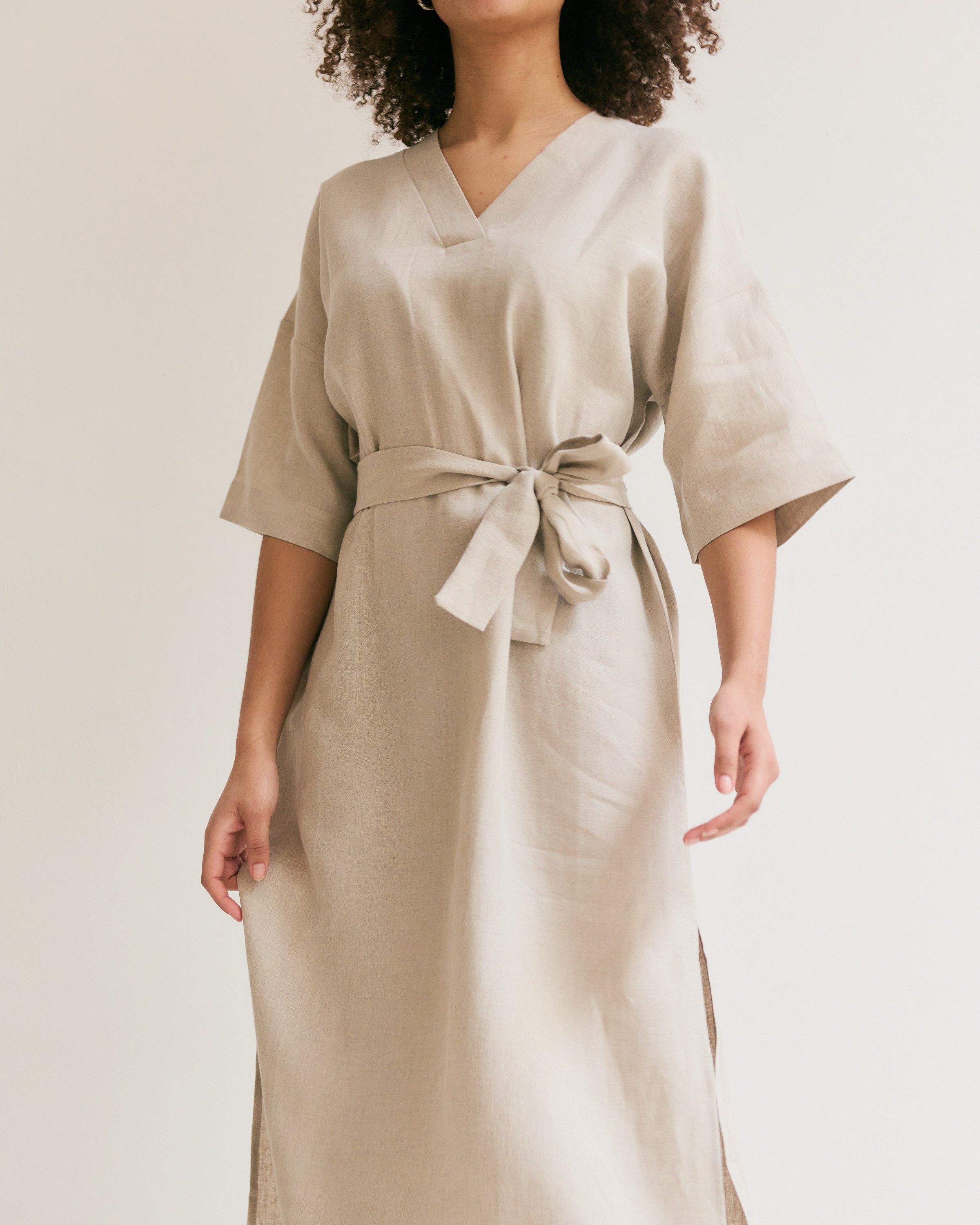 Natural linen straight dress with belt.