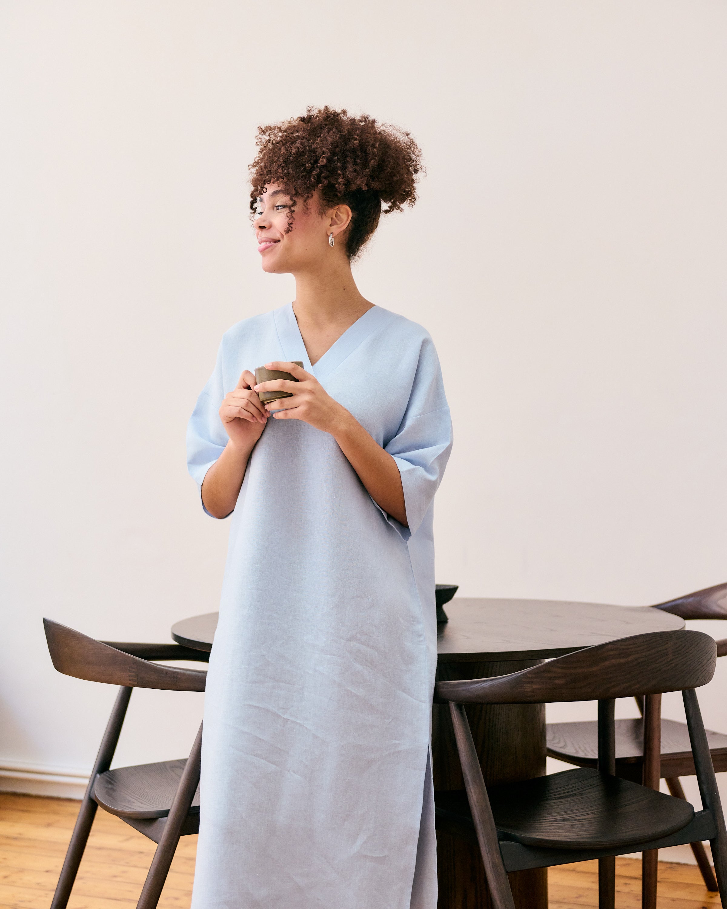 Comfortable, straight, light blue linen dress.