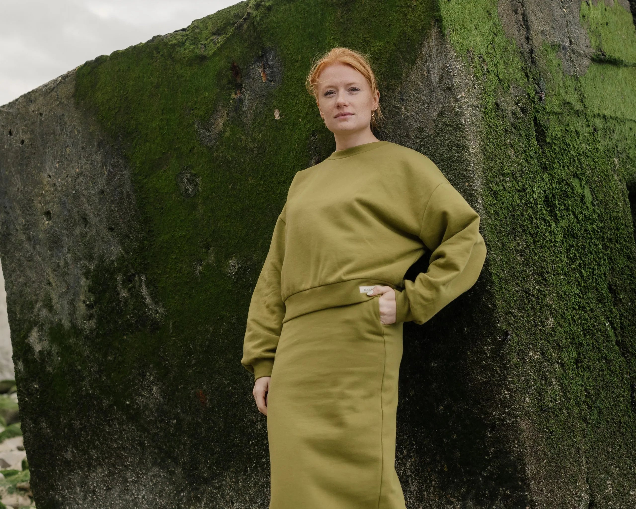 Soft and comfortable green organic cotton skirt and sweater.