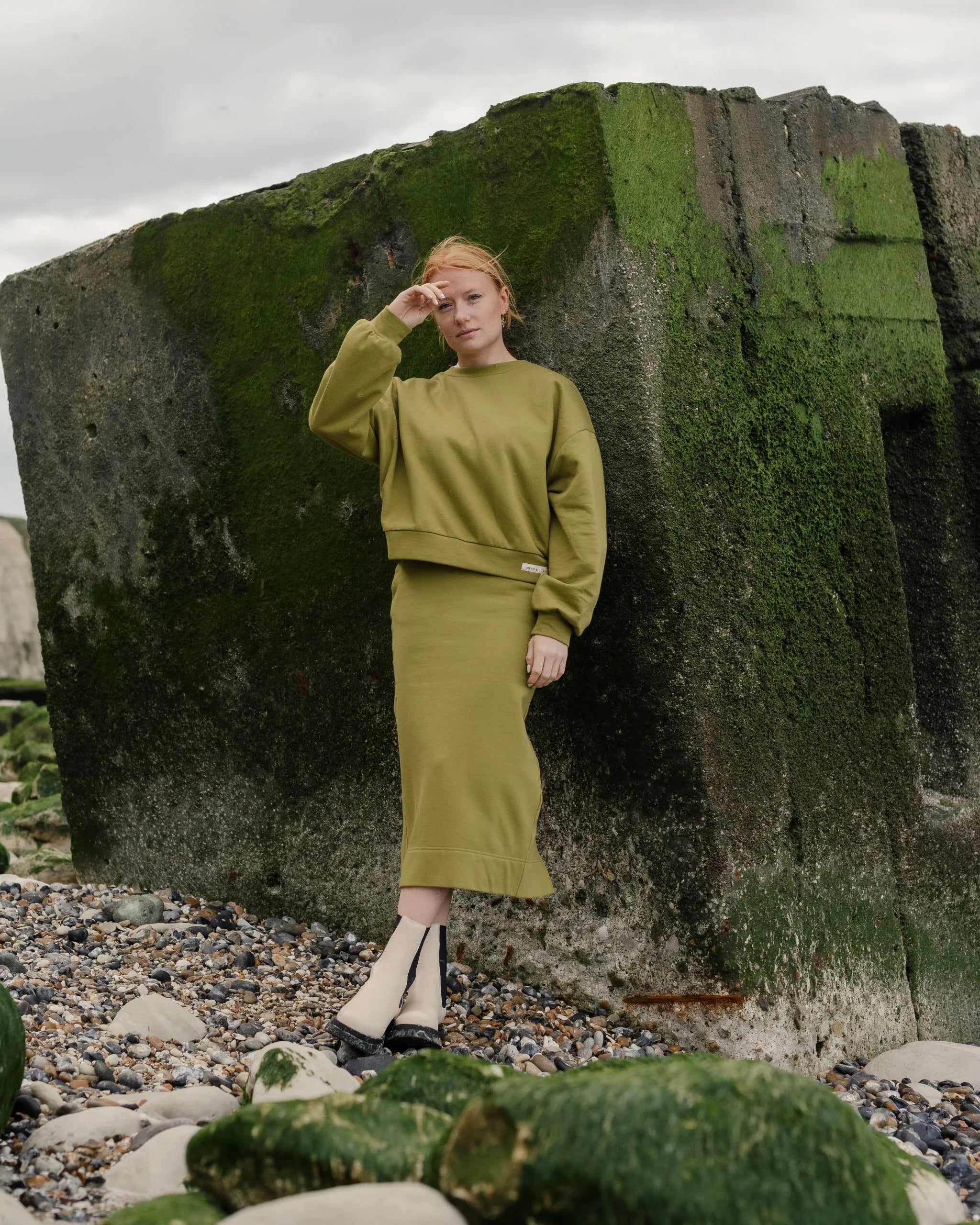 Soft and comfortable green organic cotton skirt and sweater.