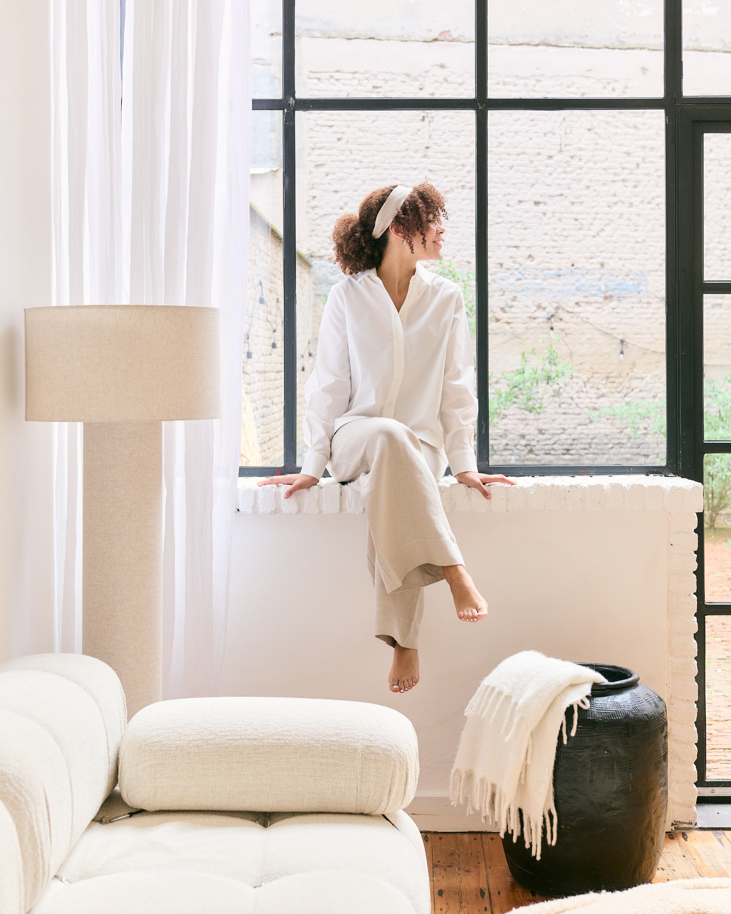 Offwhite cotton shirt and natural linen pants.