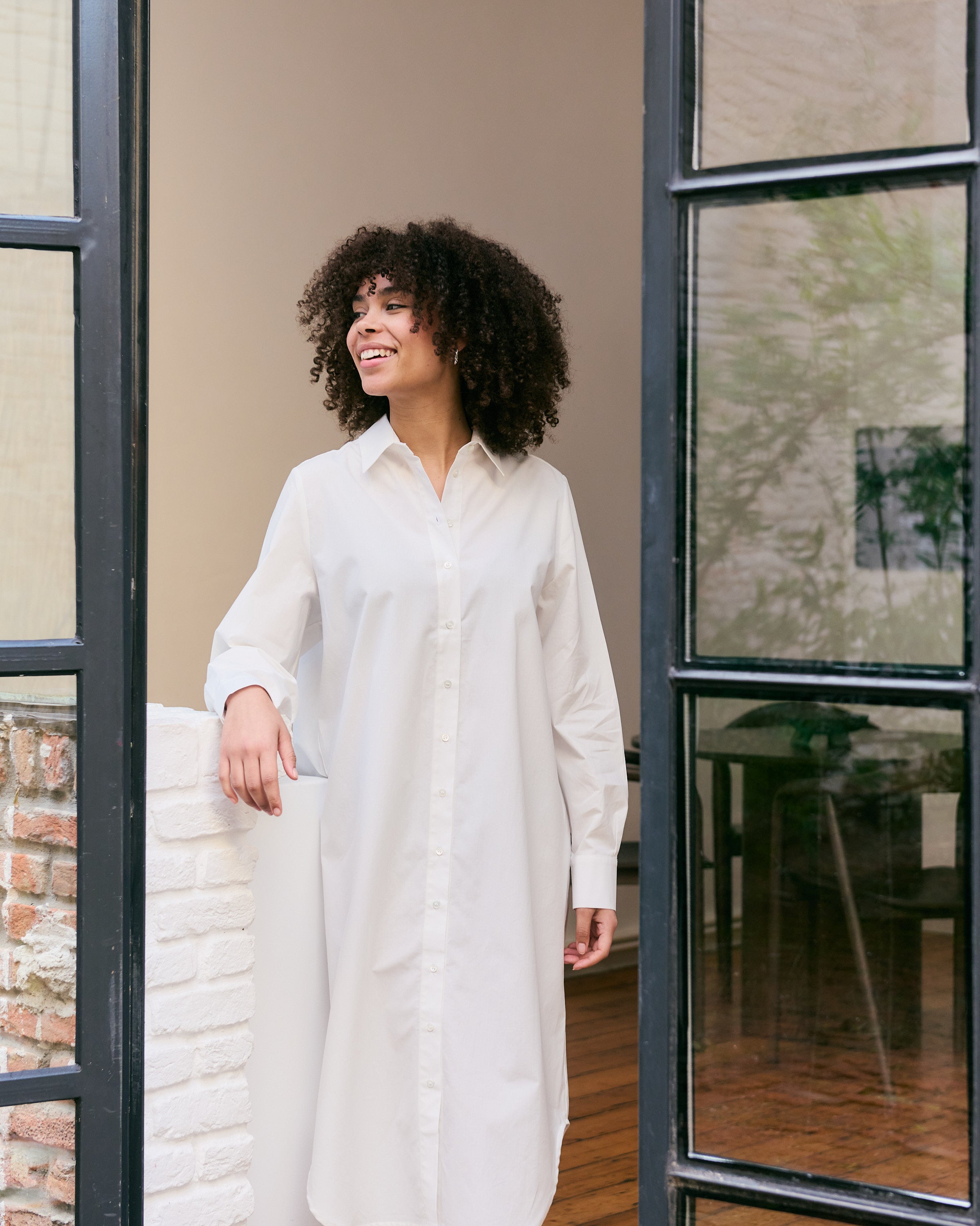 Comfortable and light offwhite organic cotton shirtdress.