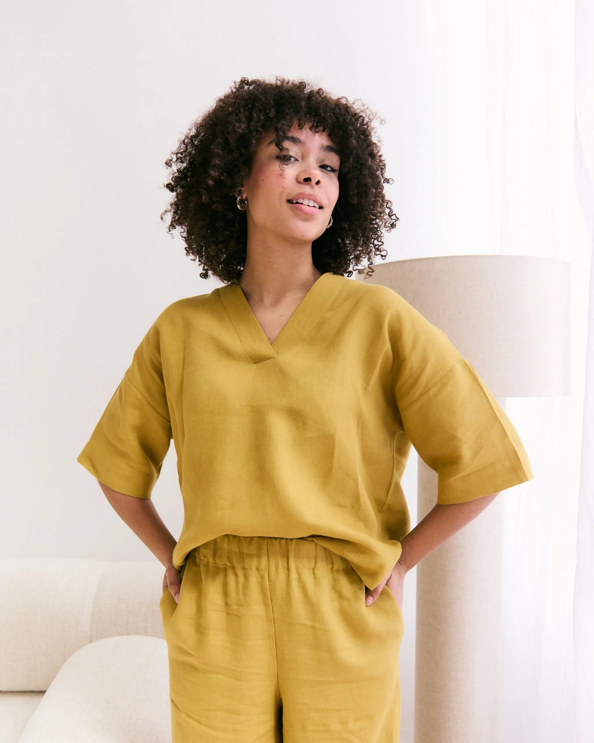 Mustard yellow blouse with short sleeves made of 100% Belgian linen.