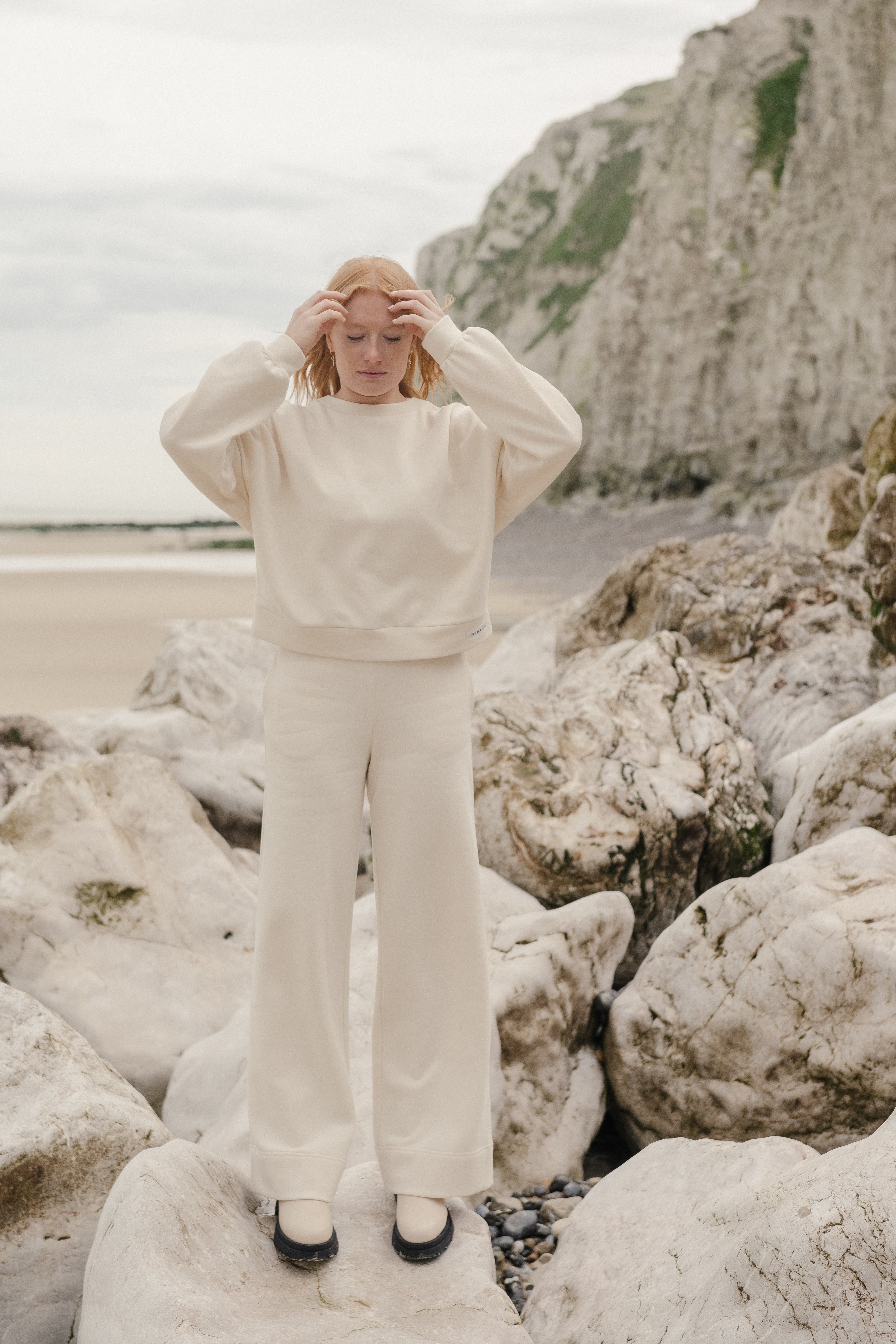 Soft and comfortable light-coloured organic cotton pants and sweater.